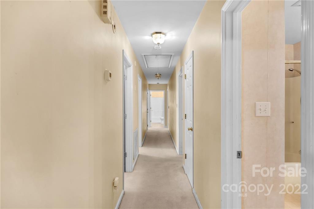 1414 Lighthouse Avenue Fort Mill, SC 29708 - Photo 16 of 47 a view of a hallway with wooden floor
