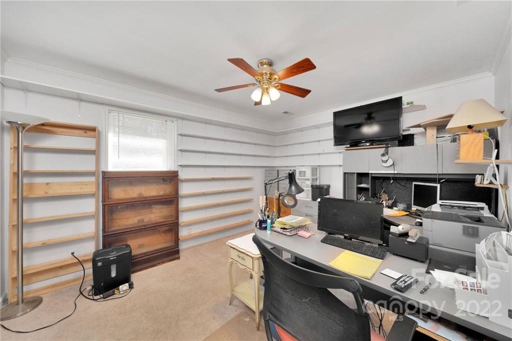 1414 Lighthouse Avenue Fort Mill, SC 29708 - Photo 21 of 47 a work room with furniture and a flat screen tv