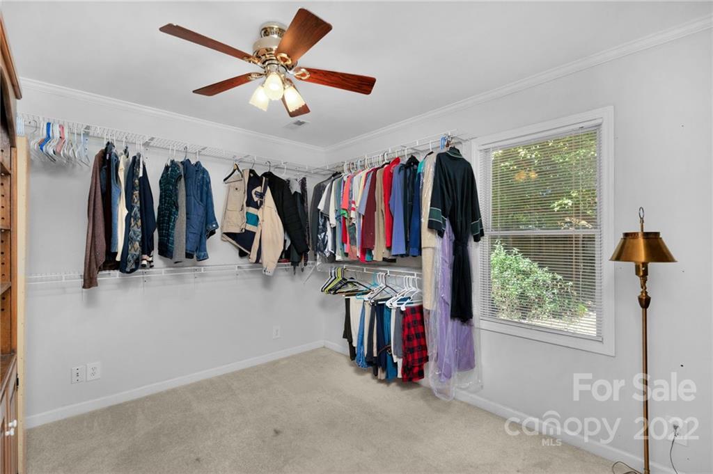 1414 Lighthouse Avenue Fort Mill, SC 29708 - Photo 23 of 47 a view of walk in closet with clothes and shoes