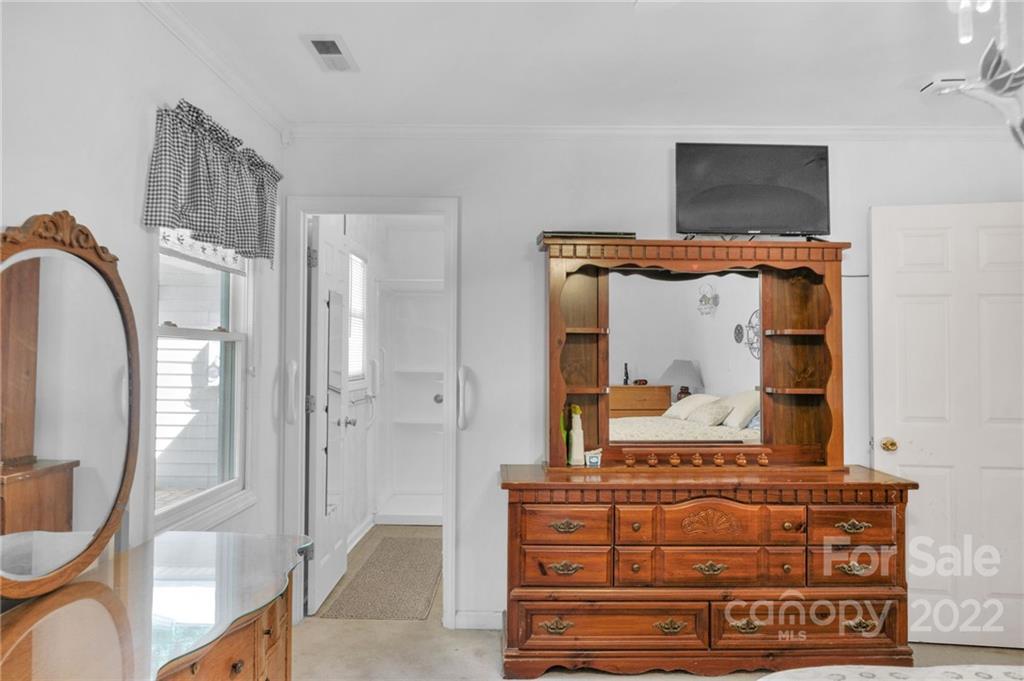 1414 Lighthouse Avenue Fort Mill, SC 29708 - Photo 26 of 47 a bathroom with a mirror and a shower