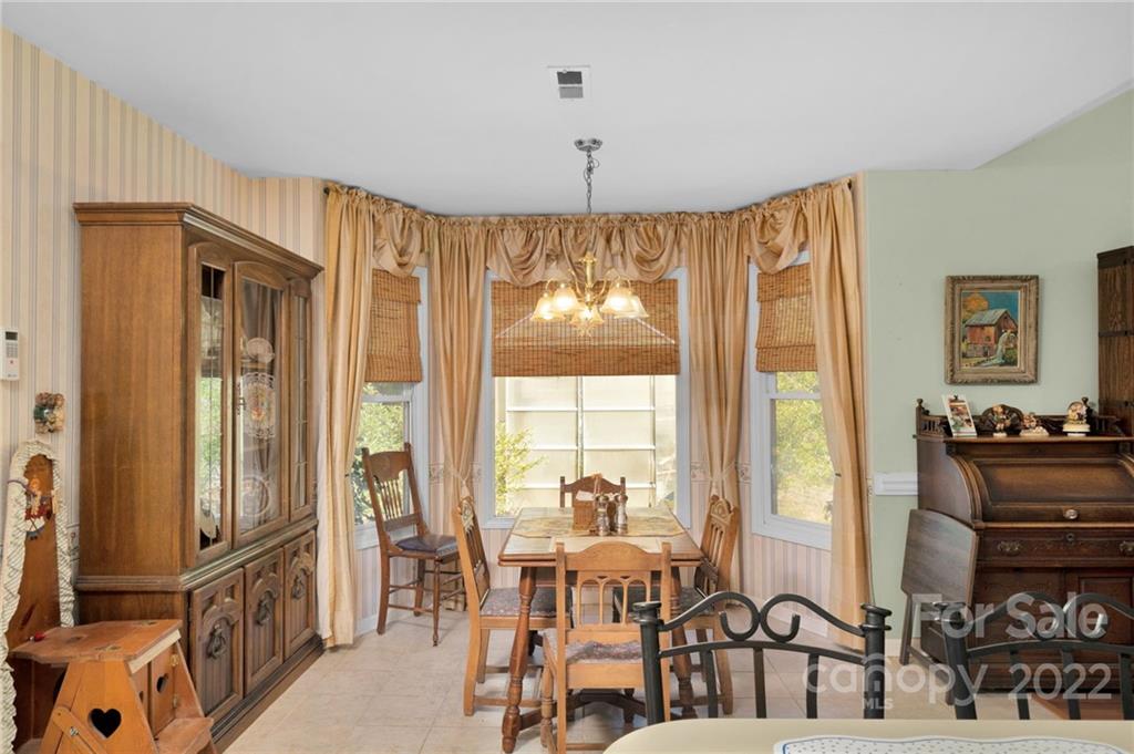 1414 Lighthouse Avenue Fort Mill, SC 29708 - Photo 29 of 47 a view of a dining room with furniture window and outside view
