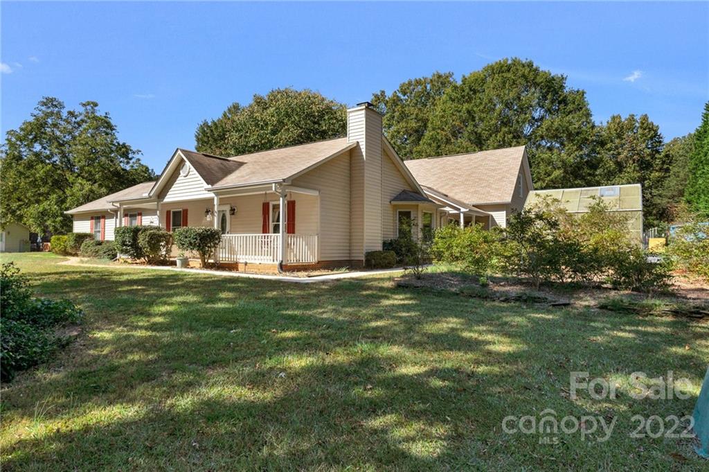 1414 Lighthouse Avenue Fort Mill, SC 29708 - Photo 3 of 47 a view of a house with a backyard