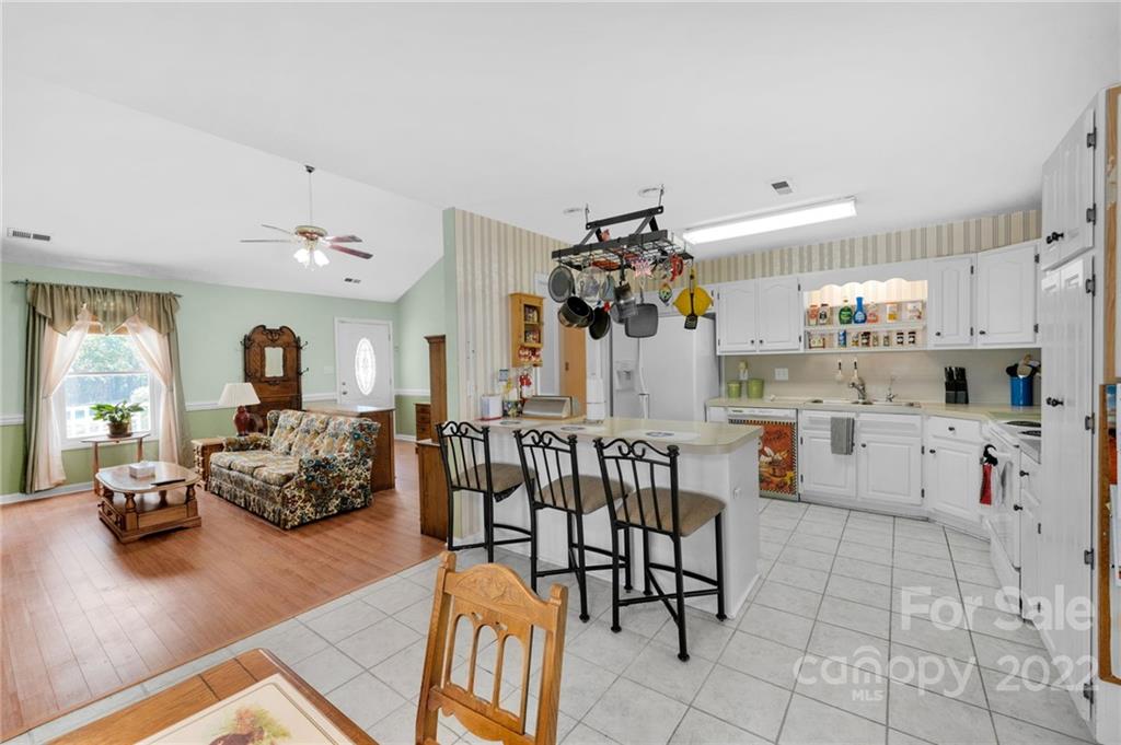 1414 Lighthouse Avenue Fort Mill, SC 29708 - Photo 32 of 47 a living room with furniture and wooden floor