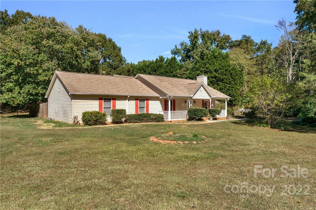 1414 Lighthouse Avenue Fort Mill, SC 29708 - Photo 4 of 47 a aerial view of a white house sitting in middle of the yard