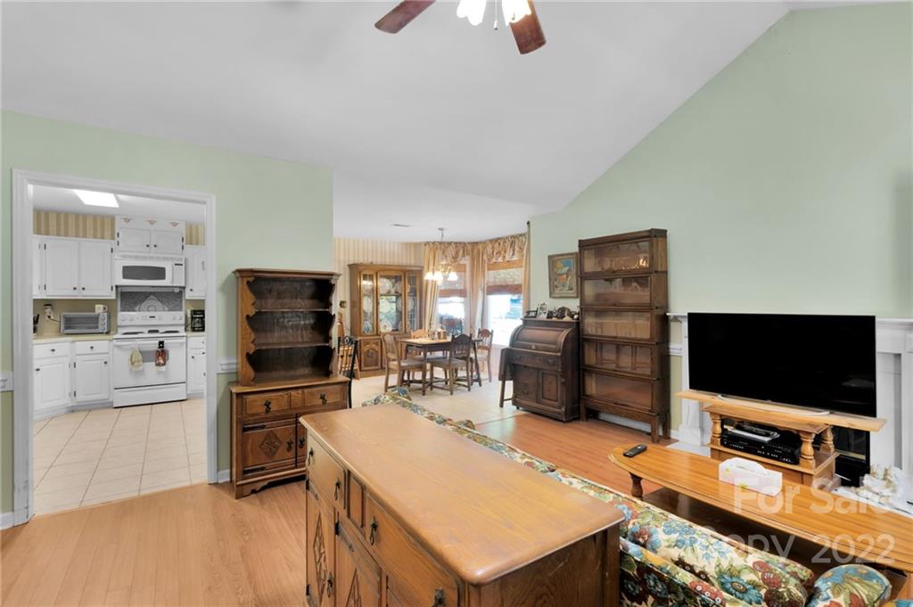 1414 Lighthouse Avenue Fort Mill, SC 29708 - Photo 8 of 47 a room with furniture and a flat screen tv