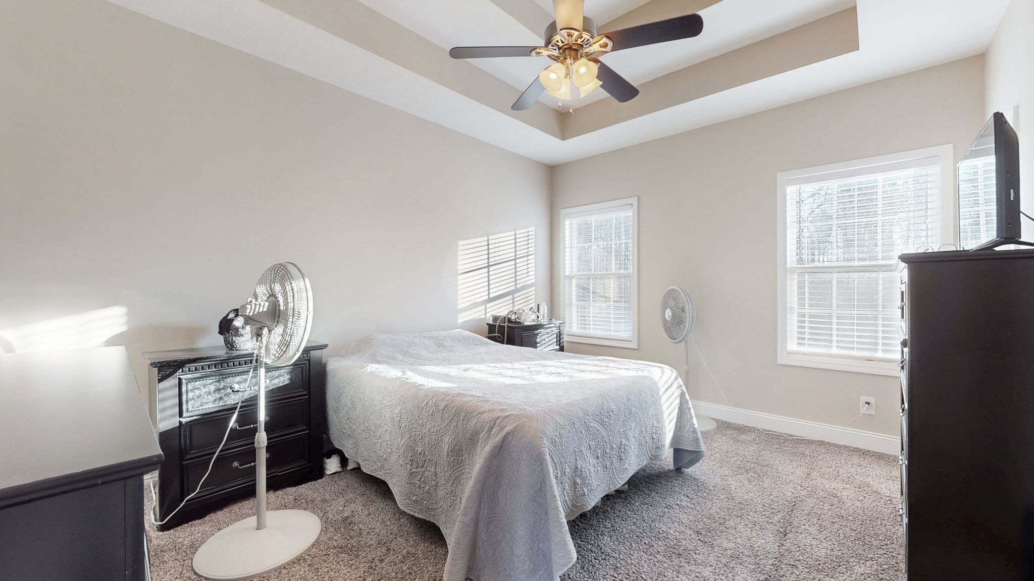 375 Misty Drive Pleasant View, TN 37146 - Photo 6 of 12 a bedroom with a bed and windows