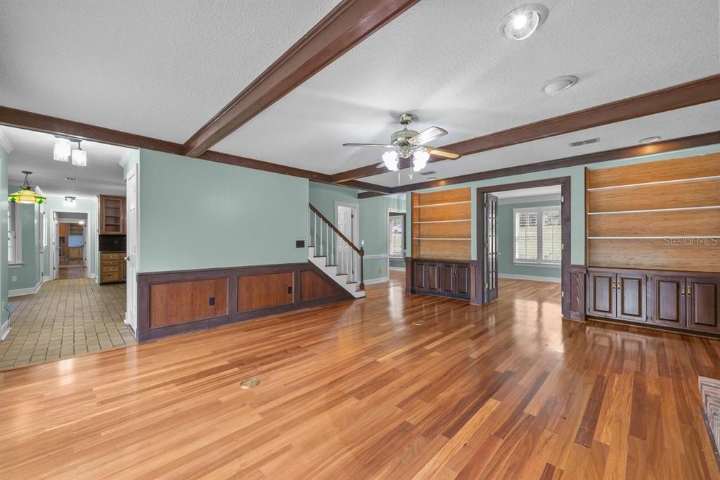 2545 Crooked Creek Point Road Middleburg, FL 32068 - Photo 15 of 54 a view of an entryway wooden floor and chandelier