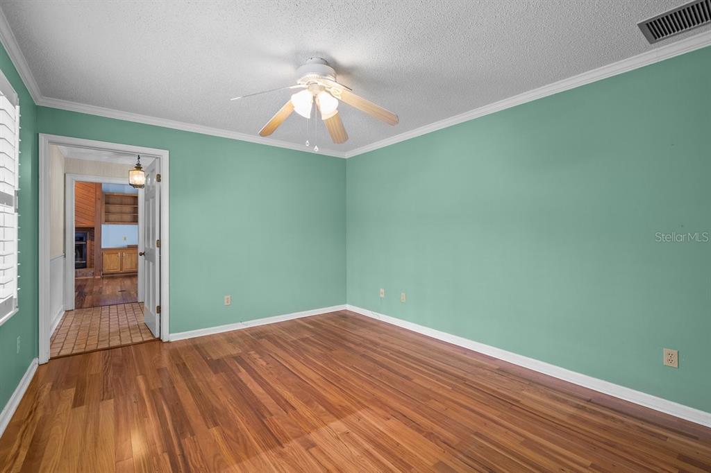 2545 Crooked Creek Point Road Middleburg, FL 32068 - Photo 22 of 54 a view of empty room with wooden floor