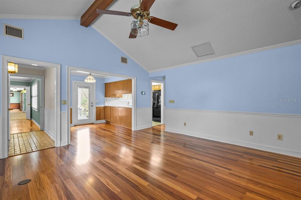 2545 Crooked Creek Point Road Middleburg, FL 32068 - Photo 27 of 54 wooden floor in an empty room with a window