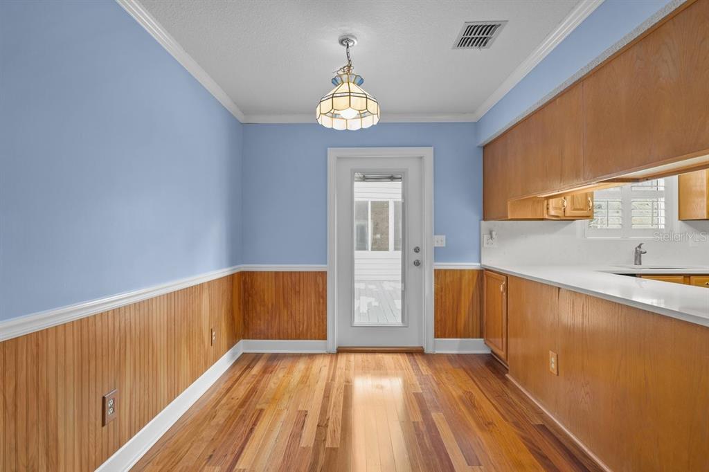 2545 Crooked Creek Point Road Middleburg, FL 32068 - Photo 28 of 54 a view of an entryway with wooden floor