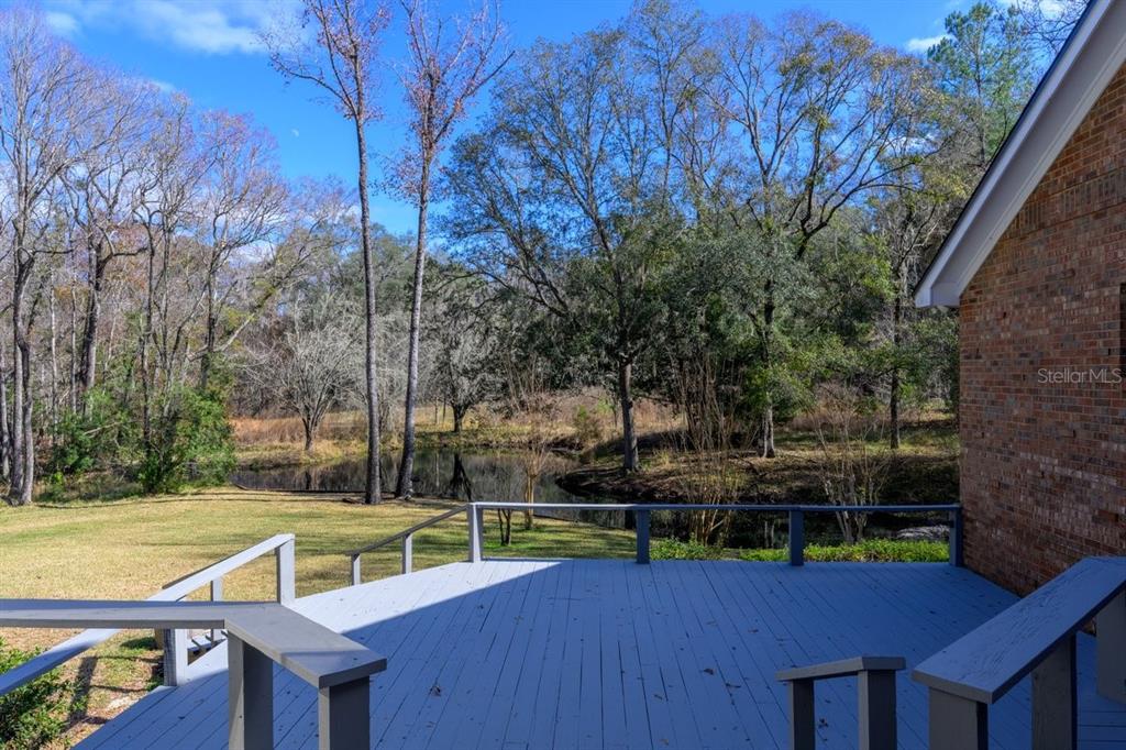 2545 Crooked Creek Point Road Middleburg, FL 32068 - Photo 6 of 54 a view of a backyard with sitting area