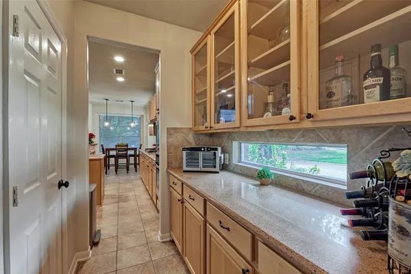 $715,000 | 23 Weeping Spruce Place, Conroe, TX 77384