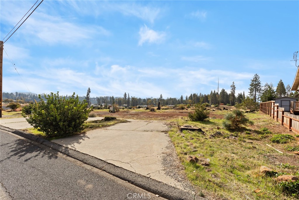 6507 Shaw Circle Magalia, CA 95954 - Photo 9 of 15 a view of a yard with an ocean view