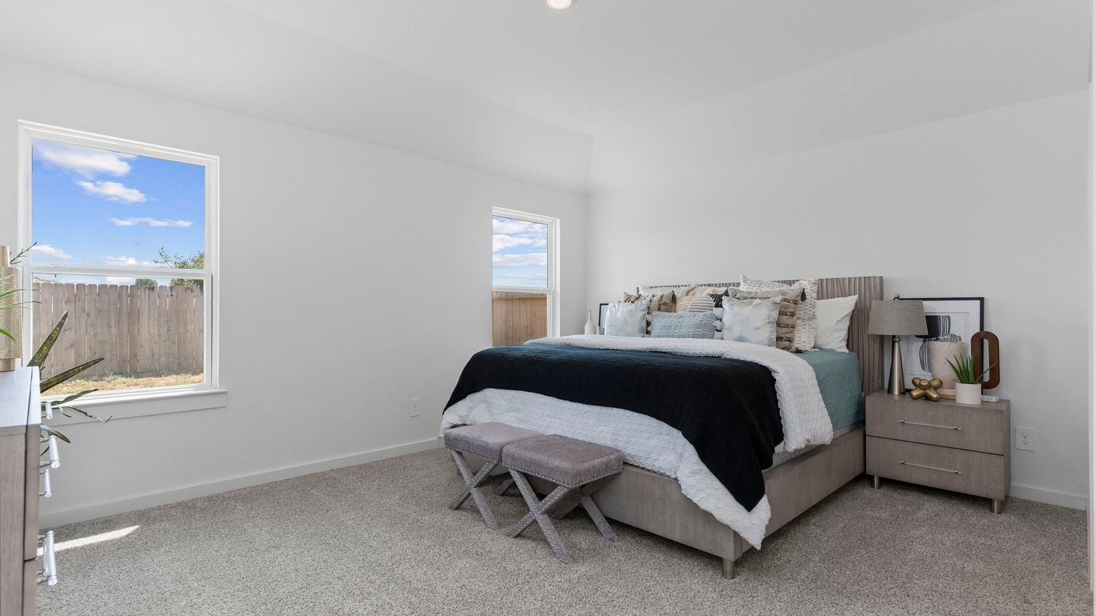 6107 Brookhaven Street Rosenberg, TX 77469 - Photo 17 of 40 a bedroom with a bed and window