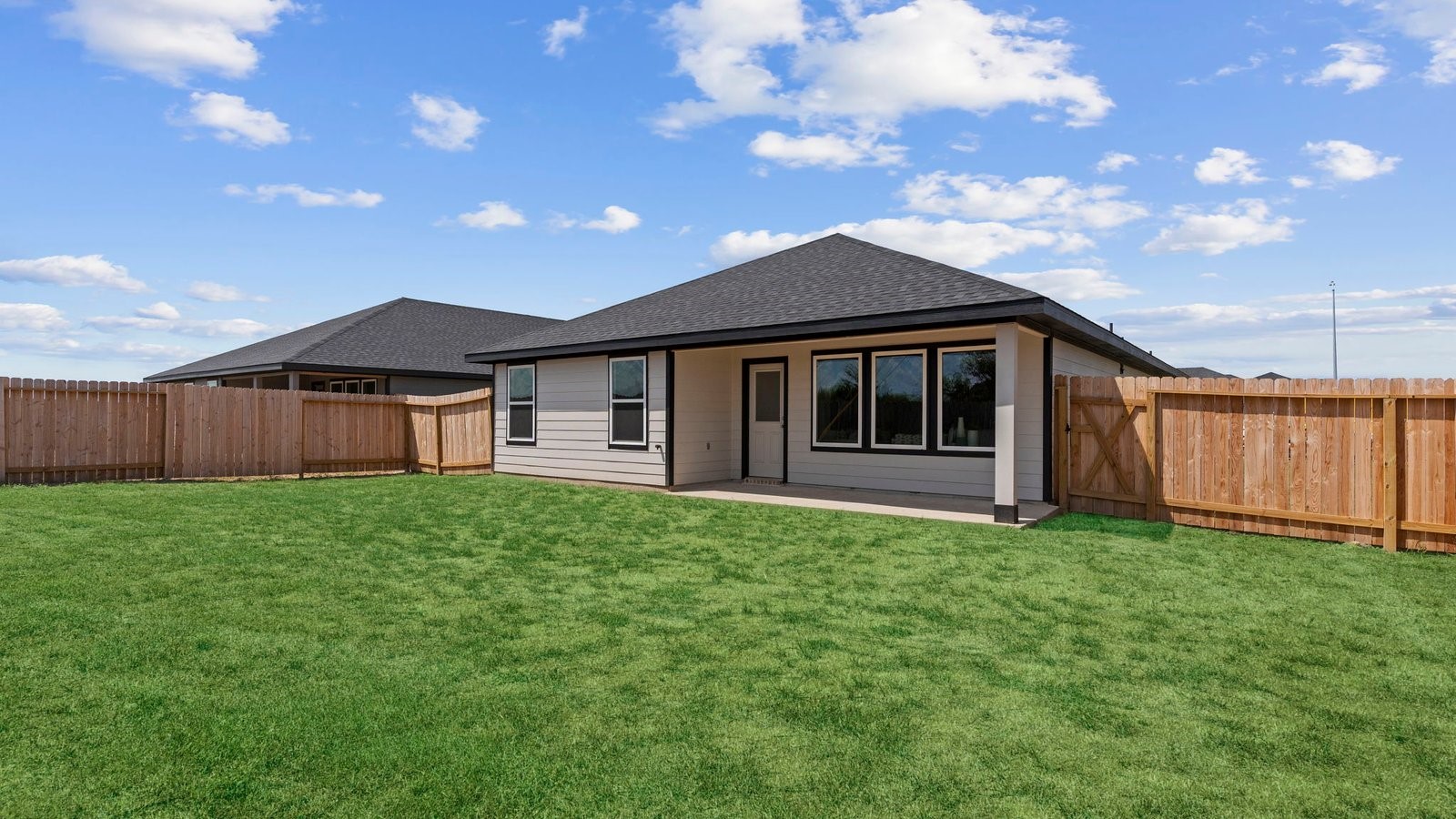 6107 Brookhaven Street Rosenberg, TX 77469 - Photo 27 of 40 a front view of a house with yard and porch