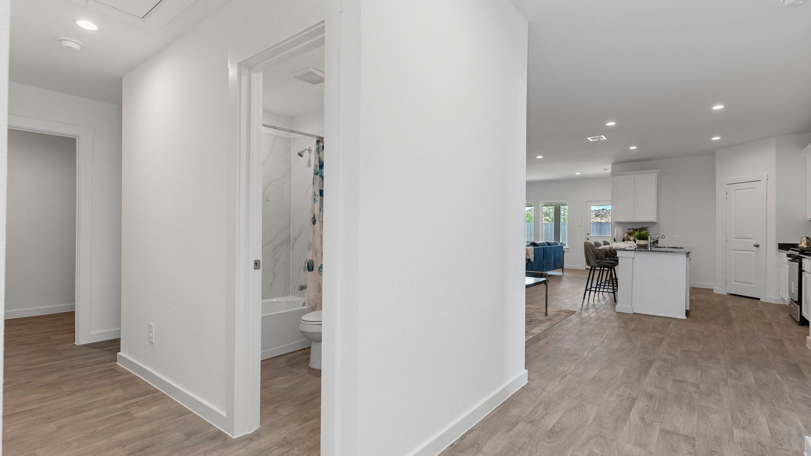 6107 Brookhaven Street Rosenberg, TX 77469 - Photo 3 of 40 a view of a kitchen and dining room