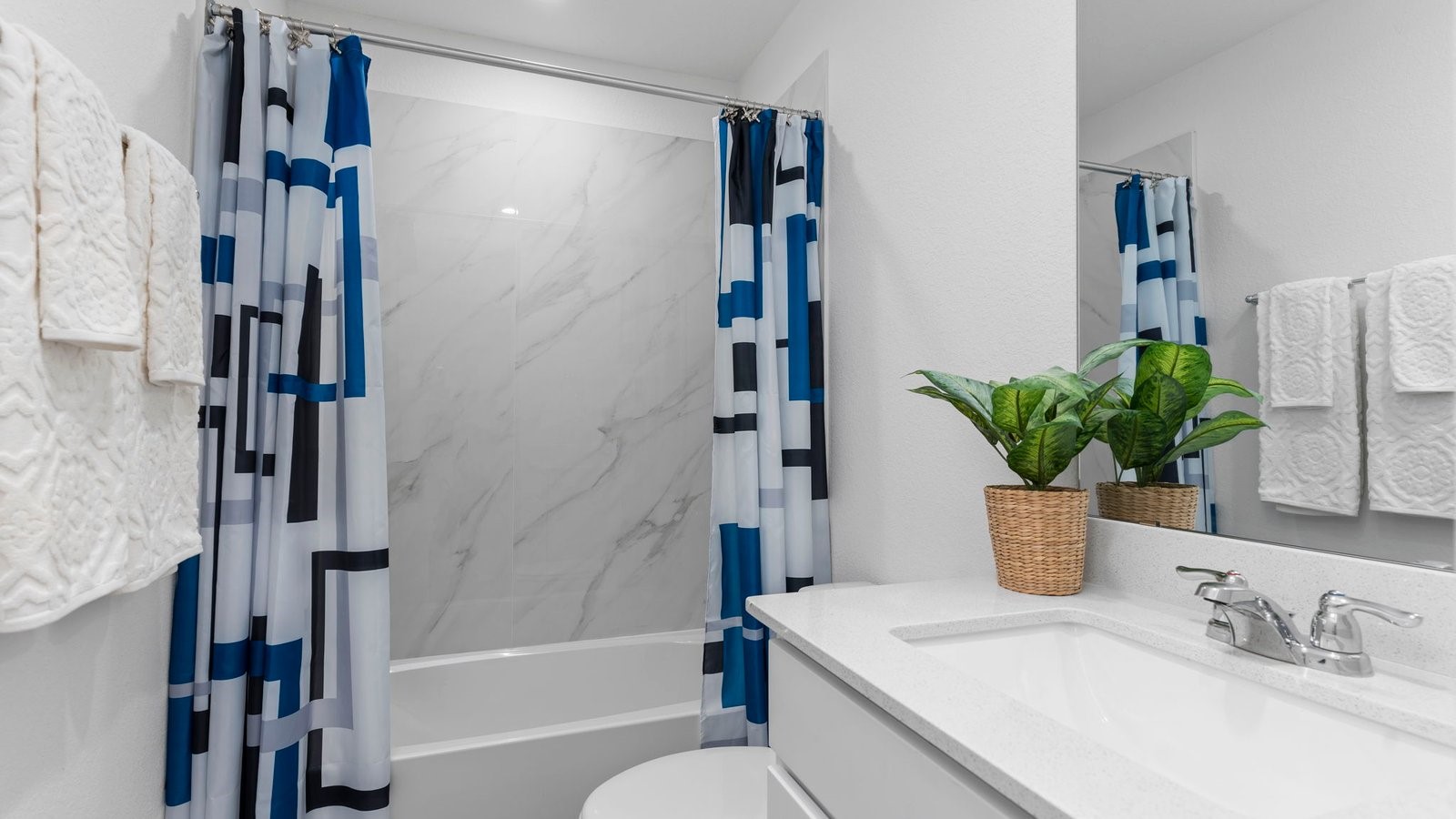 6107 Brookhaven Street Rosenberg, TX 77469 - Photo 5 of 40 a bathroom with a sink a toilet and shower