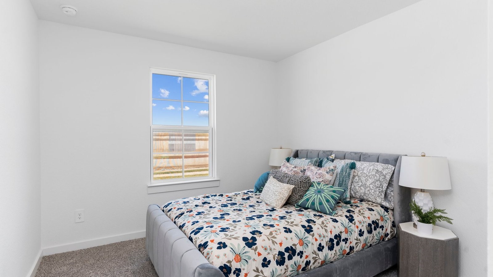 6107 Brookhaven Street Rosenberg, TX 77469 - Photo 6 of 40 a bedroom with a bed and a window