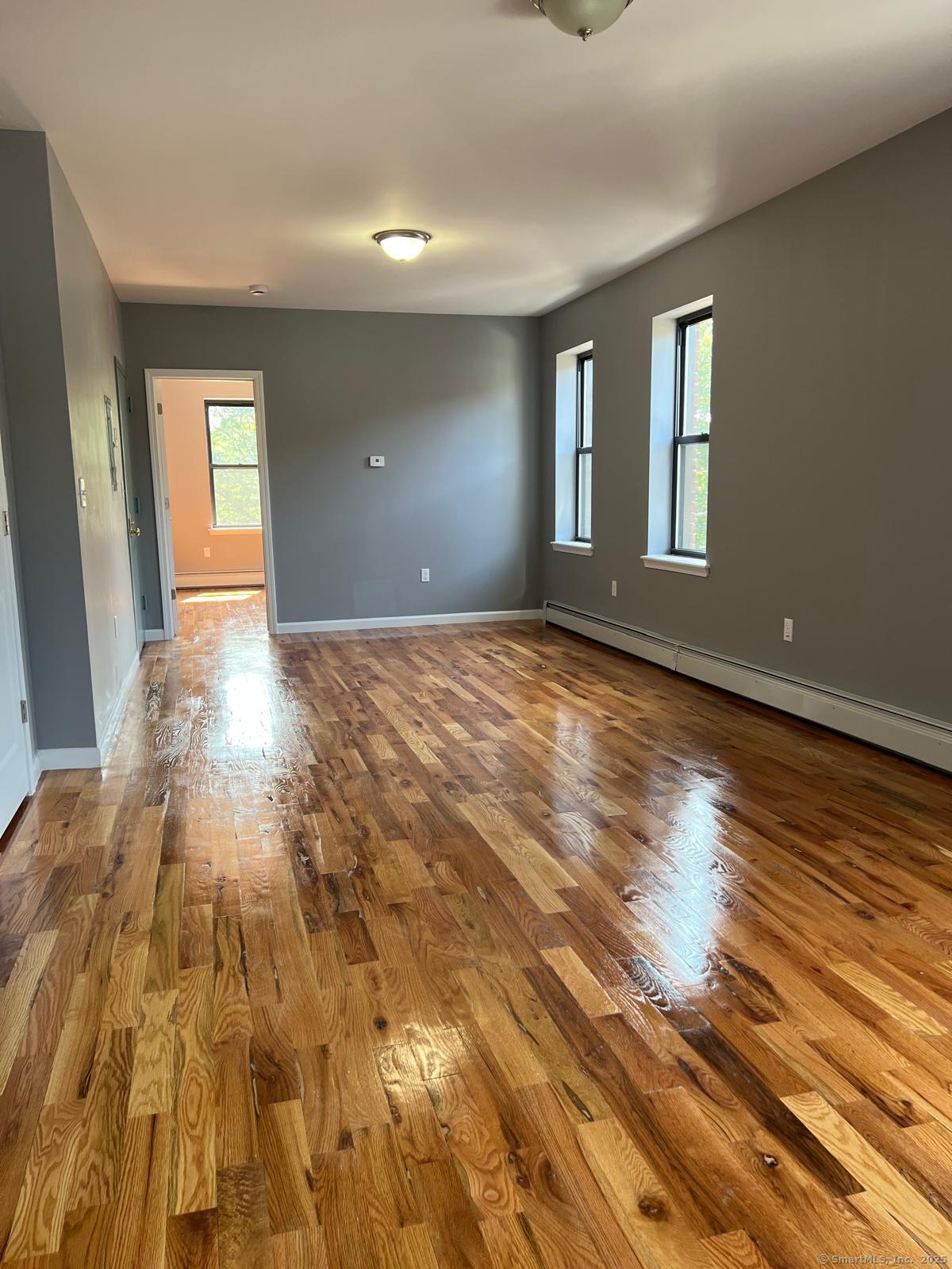 79 Barbour Street, Unit N3 Hartford, CT 06120 - Photo 5 of 7 a view of an empty room and window