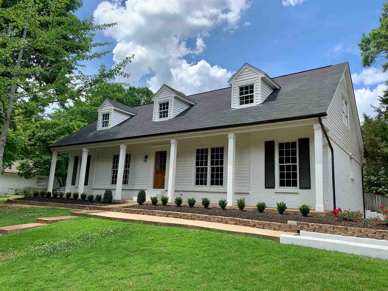 front view of house with a yard