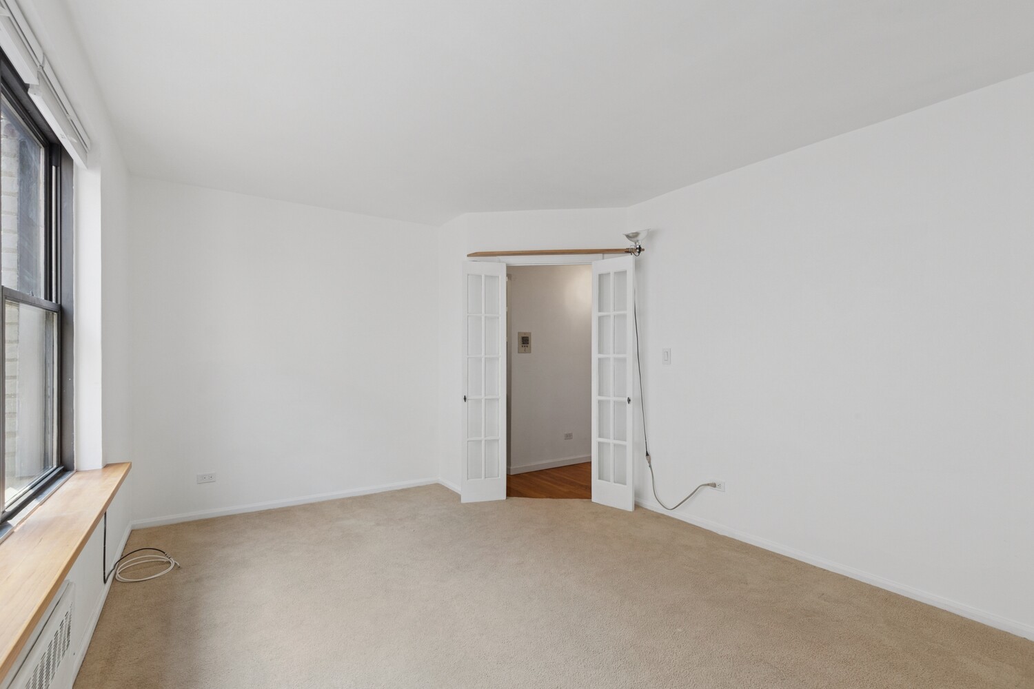 208 East 70th Street, Unit 6F Manhattan, NY 10021 - Photo 10 of 13 a view of an empty room