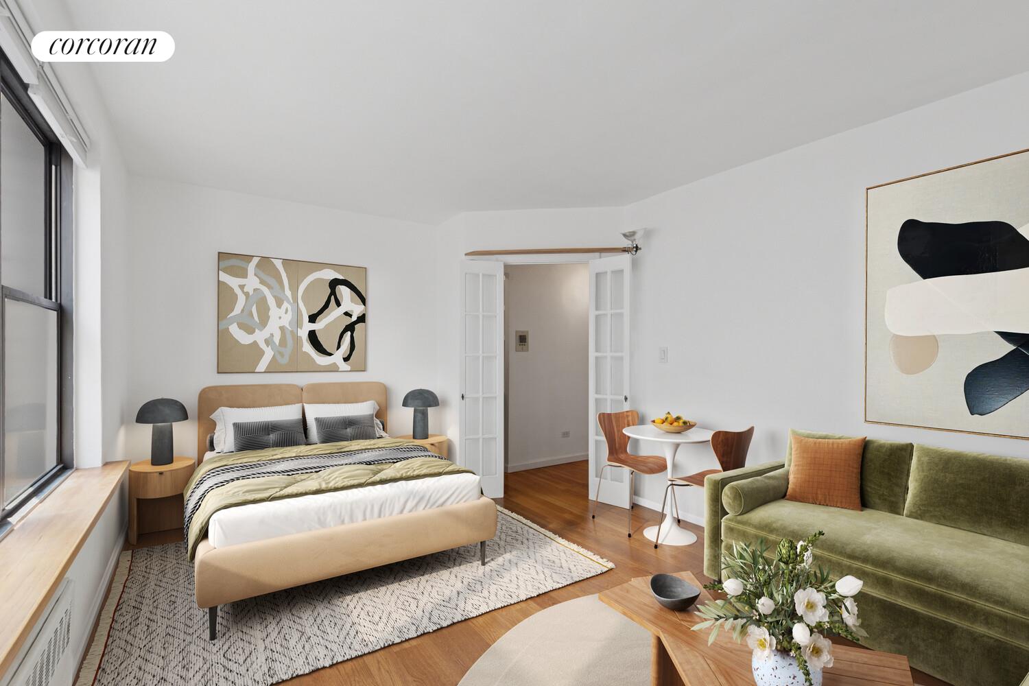 208 East 70th Street, Unit 6F Manhattan, NY 10021 - Photo 3 of 13 a bedroom with furniture and wooden floor