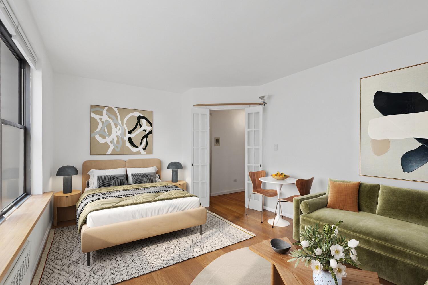 208 East 70th Street, Unit 6F Manhattan, NY 10021 - Photo 9 of 13 a bedroom with furniture and wooden floor