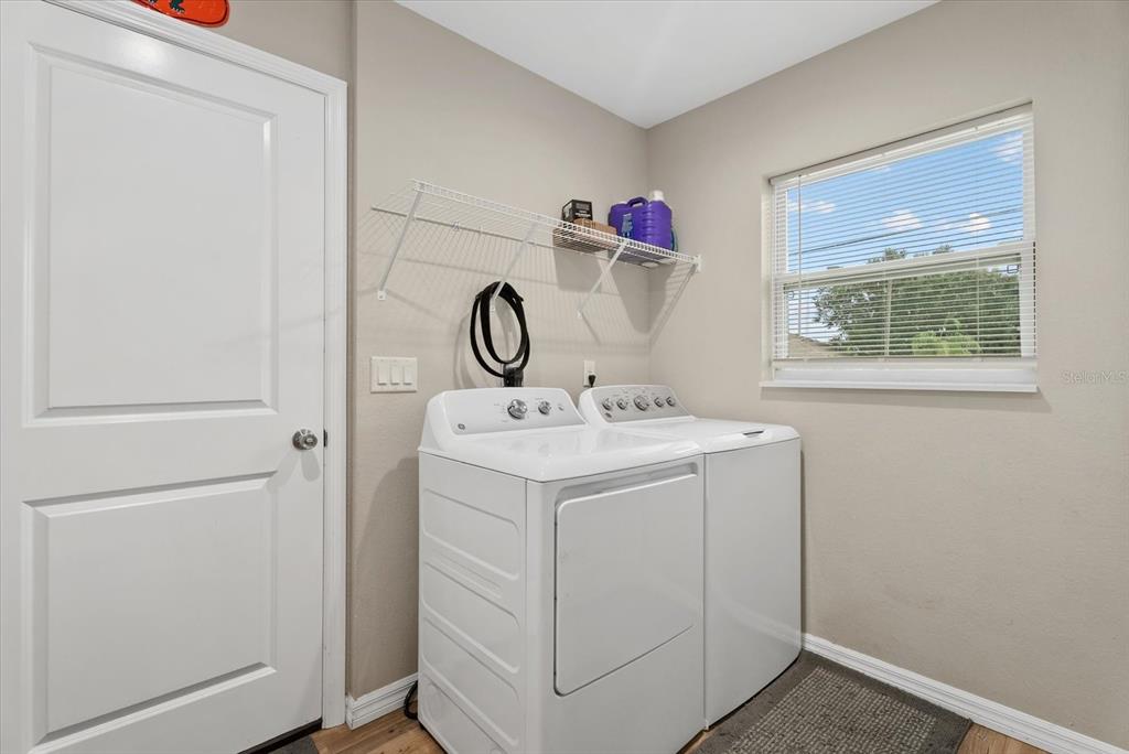 8288 Southwest Sunnybreeze Road Arcadia, FL 34269 - Photo 15 of 18 a utility room with dryer and washer