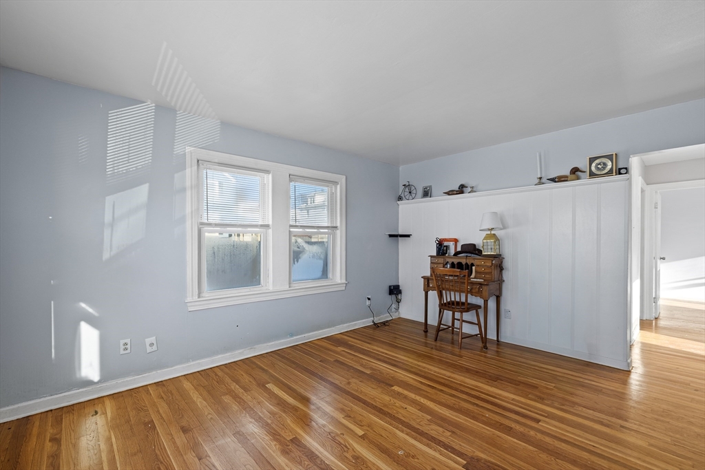 57-59 Larchwood Road, Unit 1 Methuen, MA 01844 - Photo 2 of 16 a view of a livingroom with furniture and wooden floor