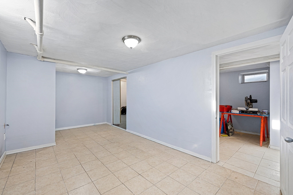 57-59 Larchwood Road, Unit 1 Methuen, MA 01844 - Photo 9 of 16 a view of a room and a projector room