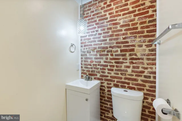 a view of an empty room with stairs