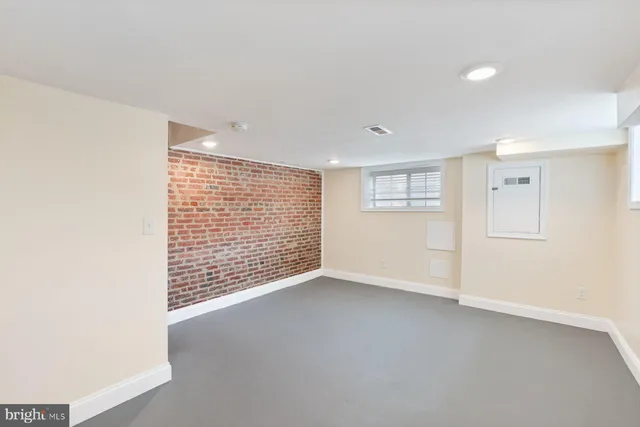an empty room with a workbench