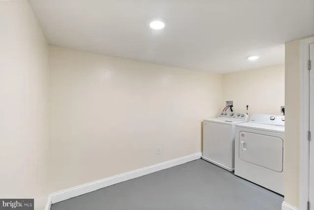 a view of a hallway with staircase