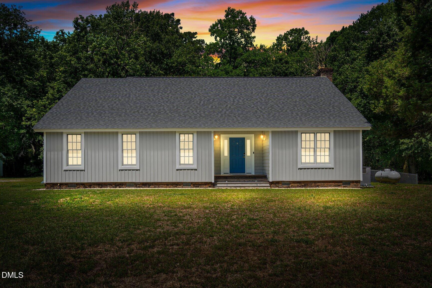 726 Thomas Road Rocky Mount, NC 27801 - Photo 1 of 55 a view of a house with a yard
