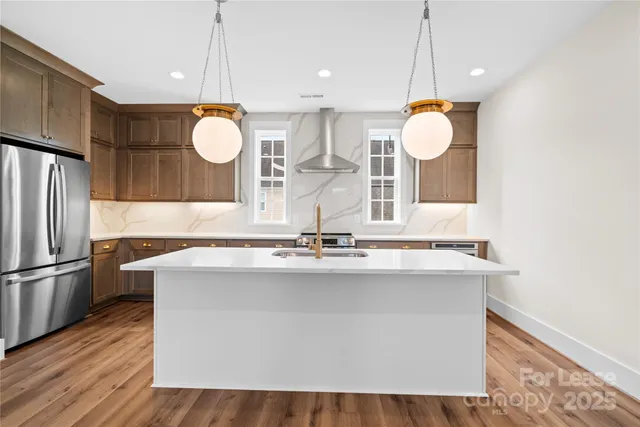 a kitchen with a sink and stove