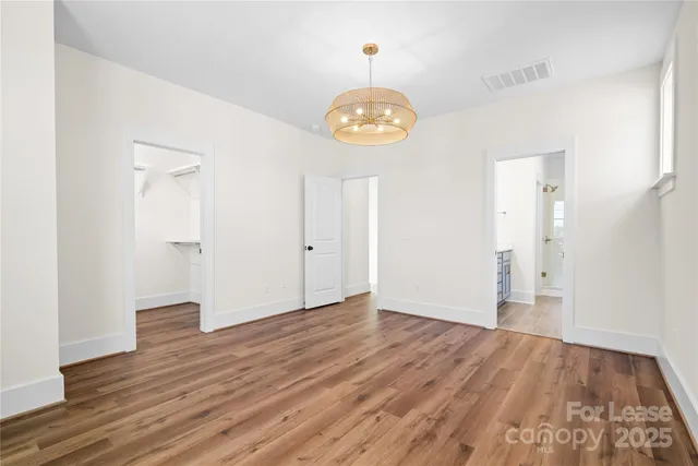 a bathroom with a shower sink and mirror