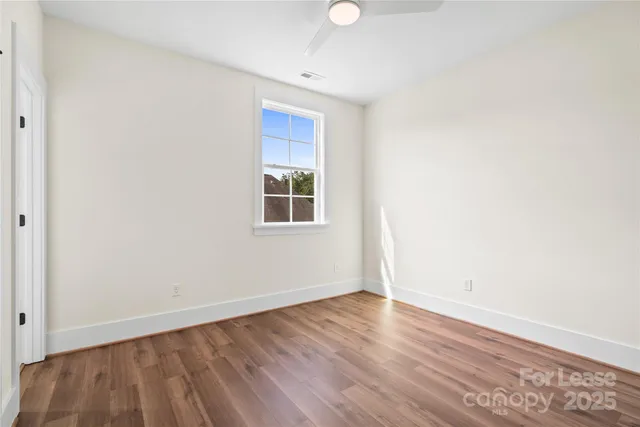 a bathroom with a bathtub and a toilet