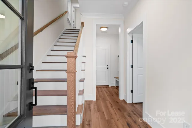 a view of room with hardwood floor
