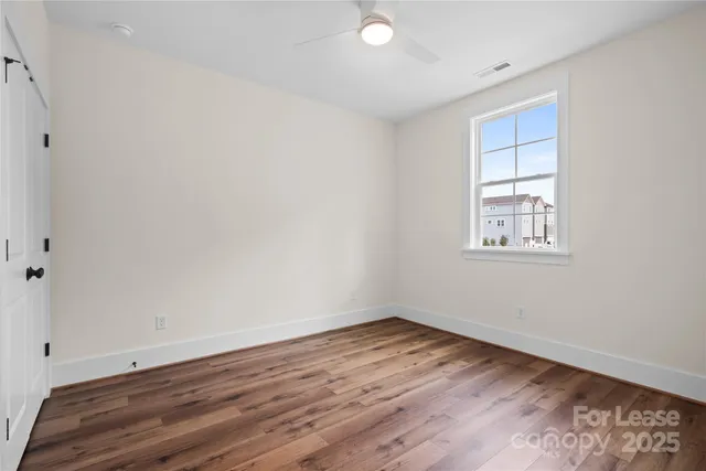 a bathroom with a sink toilet and mirror
