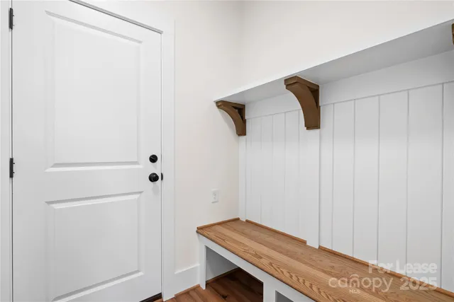 a bathroom with a sink toilet and mirror