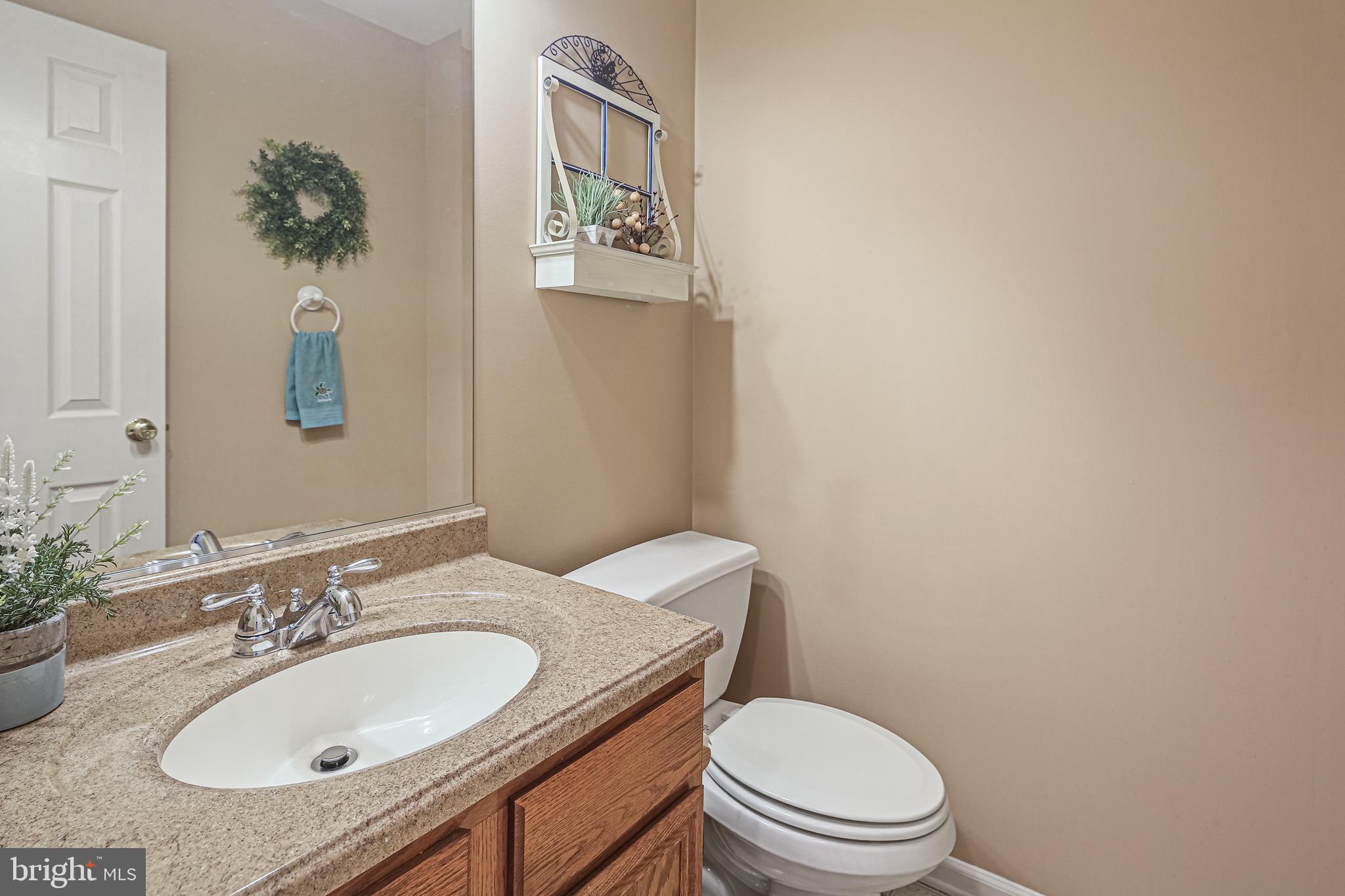 8262 Rippling Branch Road Laurel, MD 20723 - Photo 21 of 46 Half bathroom on main level