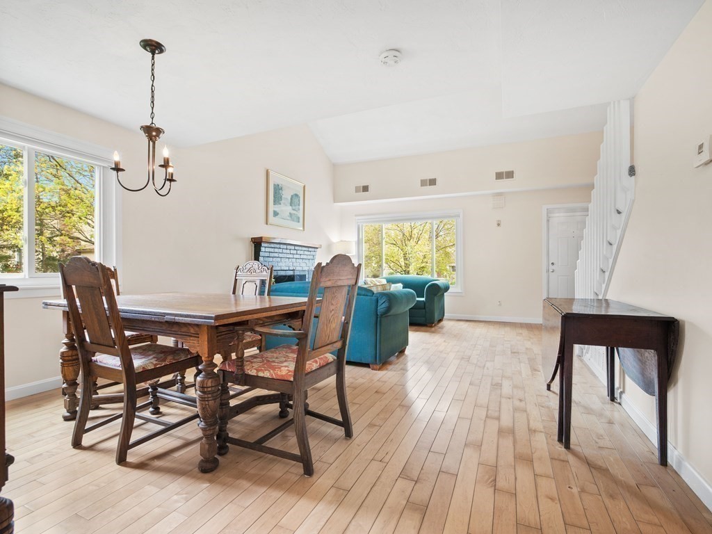 4 Kingman Road Acton, MA 01720 - Photo 8 of 32 a view of a dining room with furniture window and wooden floor