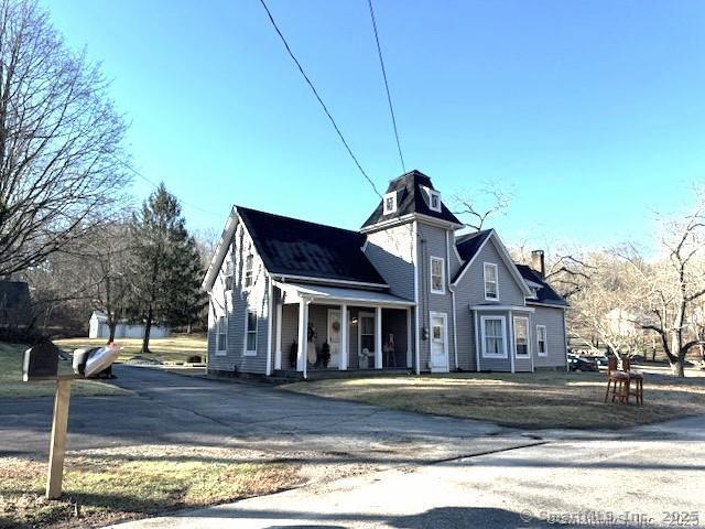 33 Lower Bartlett Road, Unit B Waterford, CT 06375 - Photo 1 of 1 a front view of a house with a garden