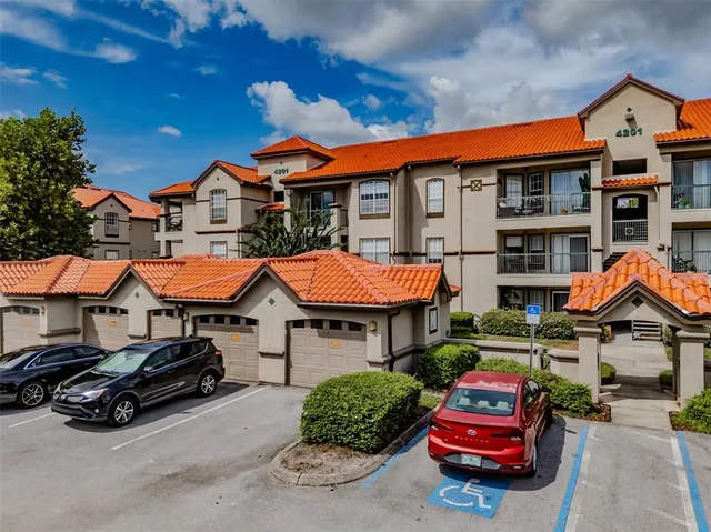 a car parked in front of a houses