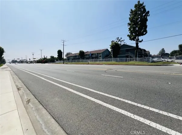 a view of a street with houses