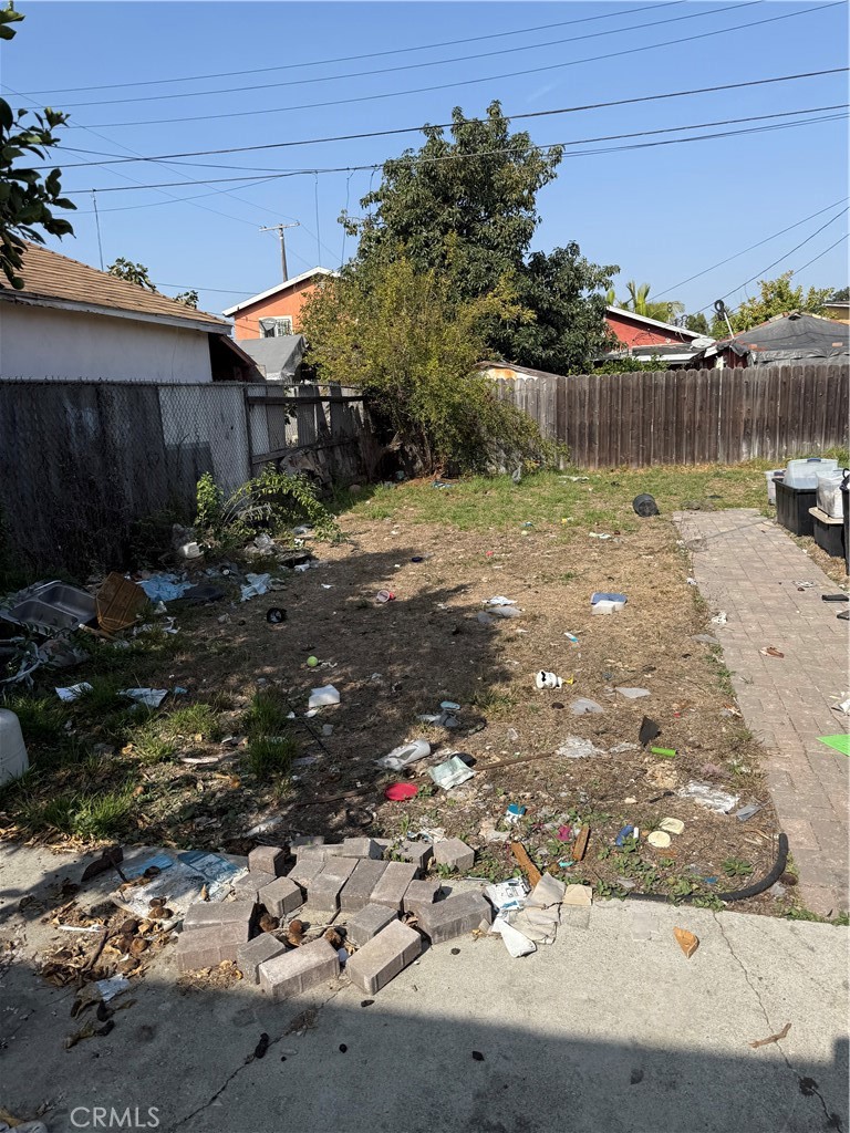 343 West 84th Street Los Angeles, CA 90003 - Photo 14 of 15 a view of a lake with a house in the background