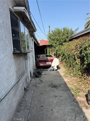 a view of a street with cars