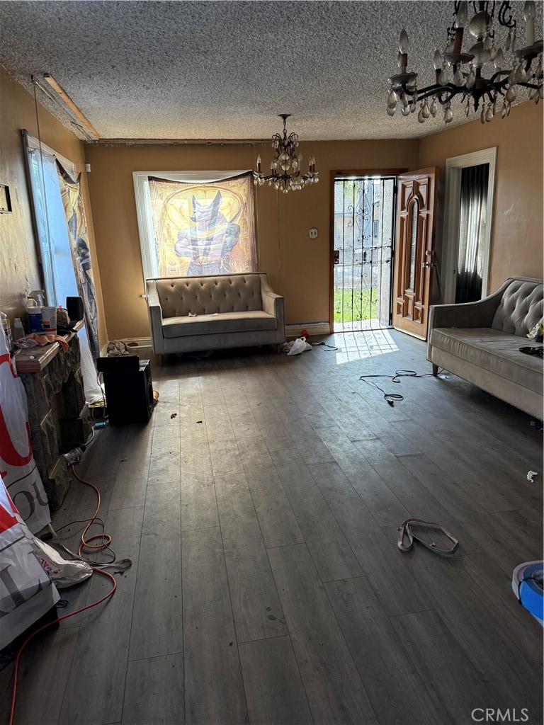 343 West 84th Street Los Angeles, CA 90003 - Photo 3 of 15 a view of a room with gym equipment