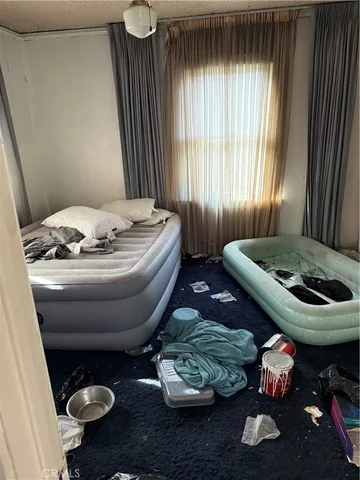 a room with furniture and window