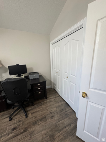 1976 River Bottom Road Springville, UT 84663 - Photo 25 of 45 Wood-finish flooring throughout, complemented by a white bi-fold closet and a white interior door with a brass knob